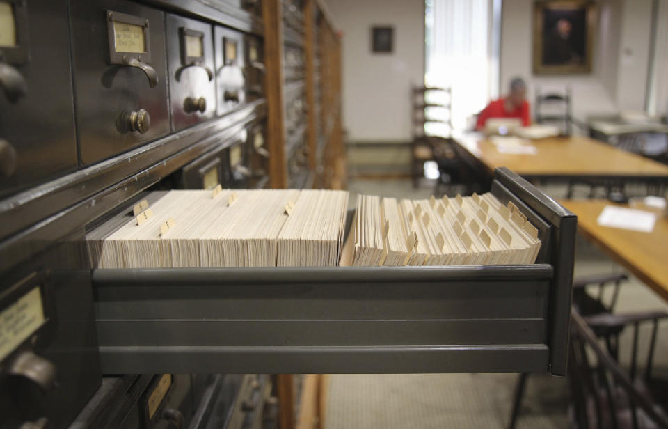 In this 2019 photo provided by the Friends Historical Library of Swarthmore College, cards are organized in the Swarthmore College Special Collections reading room in Swathmore, Pa. (Friends Historical Library of Swarthmore College via AP)