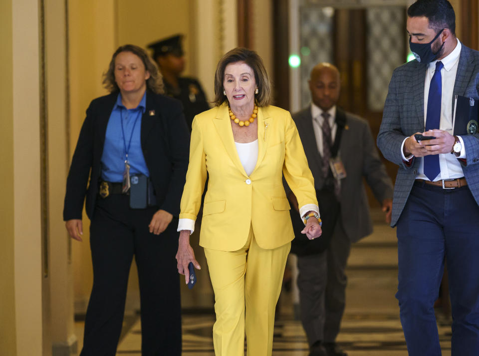 Speaker of the House Nancy Pelosi, D-Calif., walks to her office as the select committee on the Jan. 6 attack prepares to hold its first hearing Tuesday, at the Capitol in Washington, Monday, July 26, 2021. The panel will investigate what went wrong around the Capitol when hundreds of supporters of Donald Trump broke into the building and rioters brutally beat police, hunted for lawmakers and interrupted the congressional certification of Democrat Joe Biden's election victory over Trump. (AP Photo/J. Scott Applewhite)