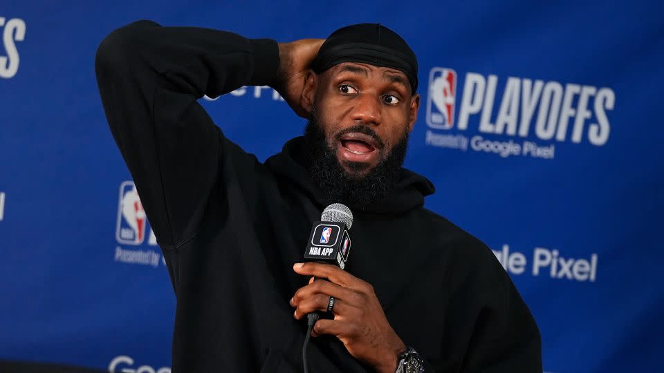 James speaks at a press conference after Monday's match-up. - Bart Young/NBAE/Getty Images