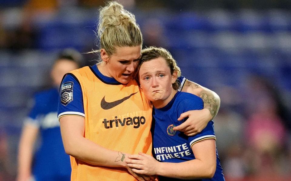 <span>Erin Cuthbert (right) is consoled by her <a class="link " href="https://sports.yahoo.com/soccer/teams/chelsea/" data-i13n="sec:content-canvas;subsec:anchor_text;elm:context_link" data-ylk="slk:Chelsea;sec:content-canvas;subsec:anchor_text;elm:context_link;itc:0">Chelsea</a> teammate Millie Bright as they face up to the idea they might not be able to stop <a class="link " href="https://sports.yahoo.com/soccer/teams/man-city/" data-i13n="sec:content-canvas;subsec:anchor_text;elm:context_link" data-ylk="slk:Manchester City;sec:content-canvas;subsec:anchor_text;elm:context_link;itc:0">Manchester City</a> taking their title.</span><span>Photograph: Nick Potts/PA</span>