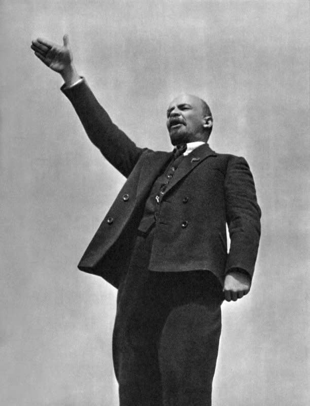 Vladimir Lenin makes a speech in the Red Square at the unveiling of a temporary monument to Stepaz Razin on May 1, 1919. On Aug. 30, 1918, Fanta Kaplan, a member of the Socialist Revolutionary Party, attempted to assassinate Lenin, shooting him twice. File Photo by Grigori Petrowitsch Goldstein/Wikimedia