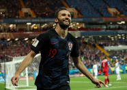<p>Croatia’s Milan Badelj celebrates scoring their first goal </p>