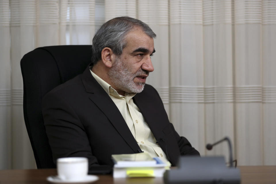 In this Nov. 9, 2019, photo, Abbas Ali Kadkhodaei, a prominent member of Iran's powerful Guardian Council, speaks in an interview with The Associated Press, in Tehran, Iran. A prominent member of Iran’s powerful Guardian Council has told The Associated Press that the Islamic Republic should stop honoring the terms of its collapsing 2015 nuclear deal with world powers amid tensions with the U.S. (AP Photo/Vahid Salemi)