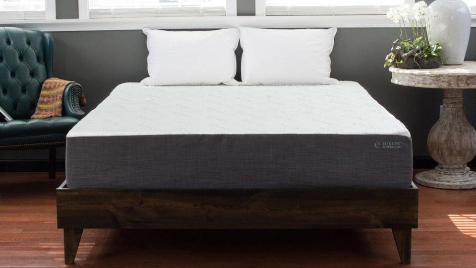 The pinewood frame and mid-century modern style make Kotter Home's platform bed a solid sleeping option.