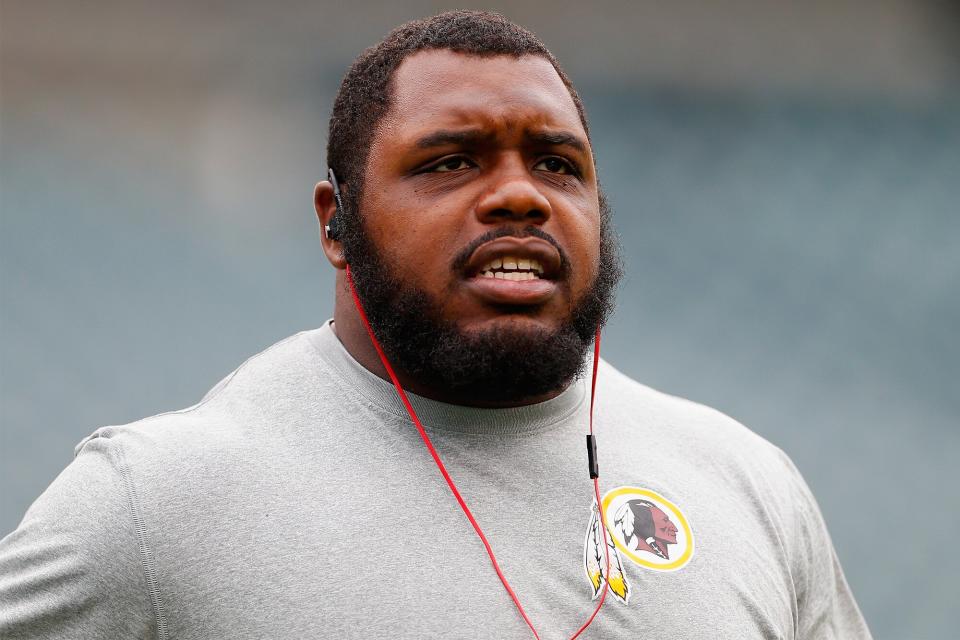 Chris Baker #92 of the Washington Redskins looks on during warm-ups before playing against the Philadelphia Eagles at Lincoln Financial Field on September 21, 2014 in Philadelphia, Pennsylvania.