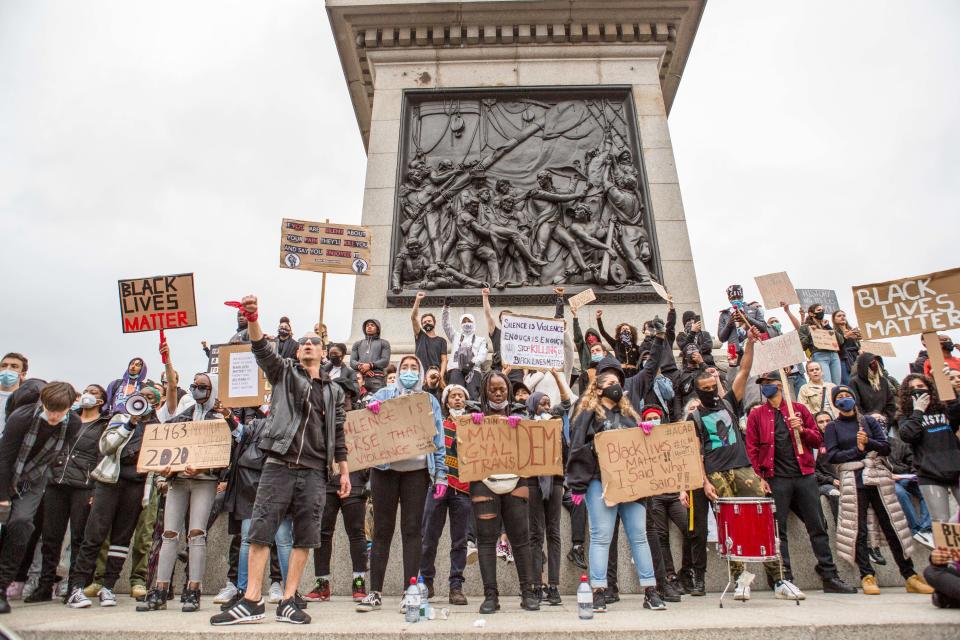  Protesters seen at Trafalgar Square with BLM placards during the demonstration. Protesters from the Black Lives Matter campaign demand justice for George Floyd and an end to Police violence in London, United Kingdom. The death of an African-American man, George Floyd, at the hands of police in Minneapolis has sparked violent protests across the USA. A video of the incident, taken by a bystander and posted on social media, showed Floyd's neck being pinned to the ground by police officer, Derek Chauvin, as he repeatedly said "I can? breathe". Chauvin was fired along with three other officers and has been charged with third-degree murder and manslaughter. (Photo by Rahman Hassani / SOPA Images/Sipa USA) 