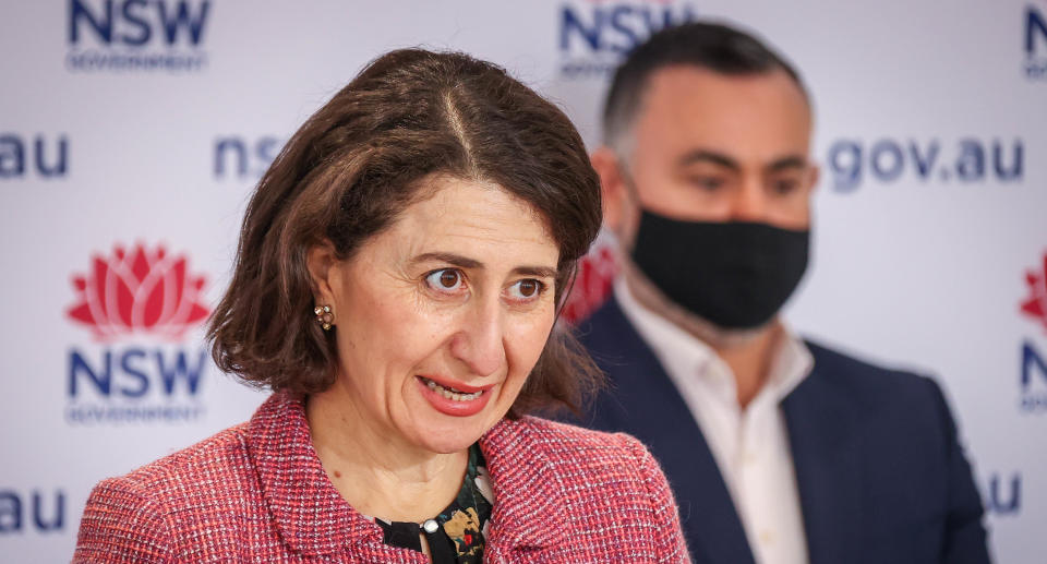 NSW Premier Gladys Berejiklian reacts as she speaks during a press conference in Sydney, Sunday, August 15, 2021. NSW recorded 415 new locally acquired cases of COVID-19 with at least 66 infectious while in the community, as the entire state continues in lockdown. (AAP Image/David Gray) NO ARCHIVING