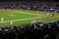 Oct 16, 2017; Bronx, NY, USA; New York Yankees right fielder Aaron Judge (99) hits a three run home run during the fourth inning aHouston Astros during game three of the 2017 ALCS playoff baseball series at Yankee Stadium. Mandatory Credit: Brad Penner-USA TODAY Sports