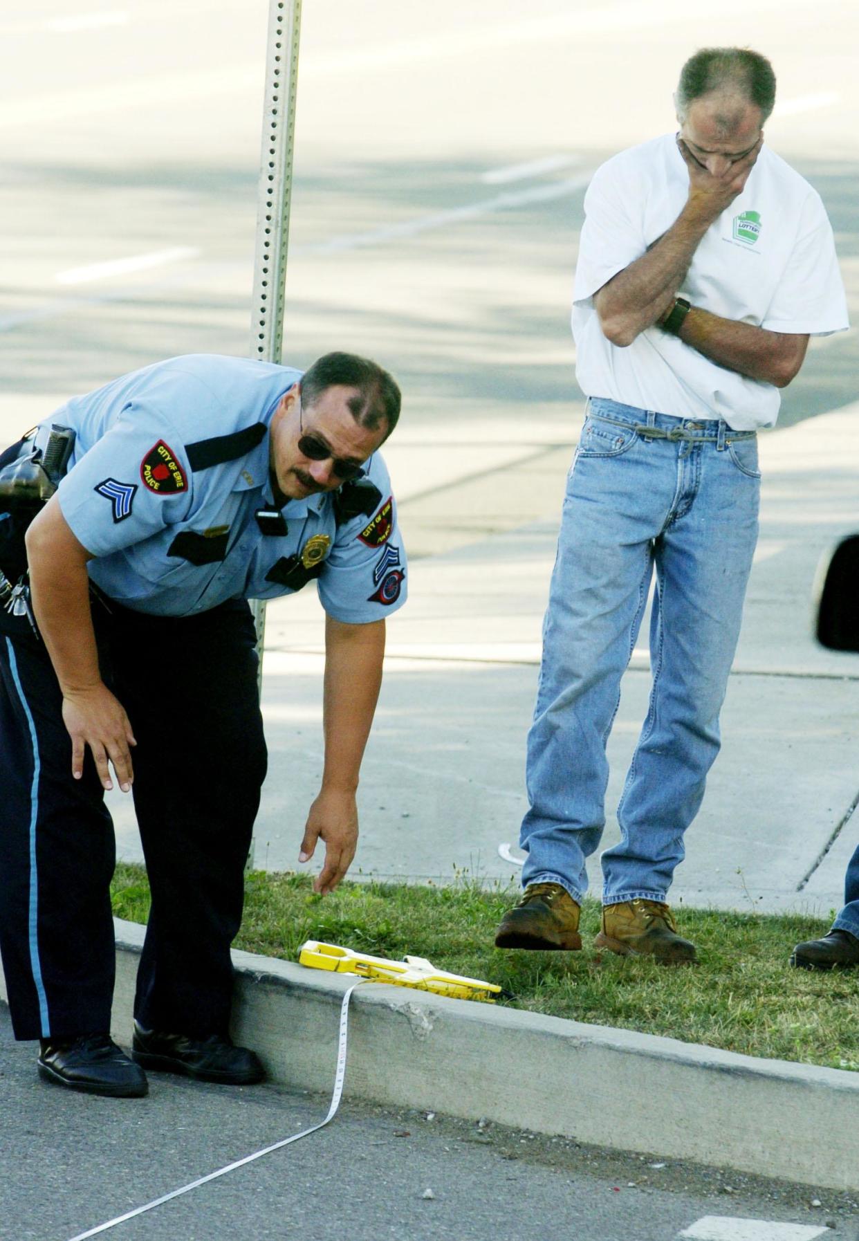 This is an August 2006 file photo of then-Cpl. Jeff Annunziata of the Erie Bureau of Police, on the scene of a traffic accident on Erie's east side.