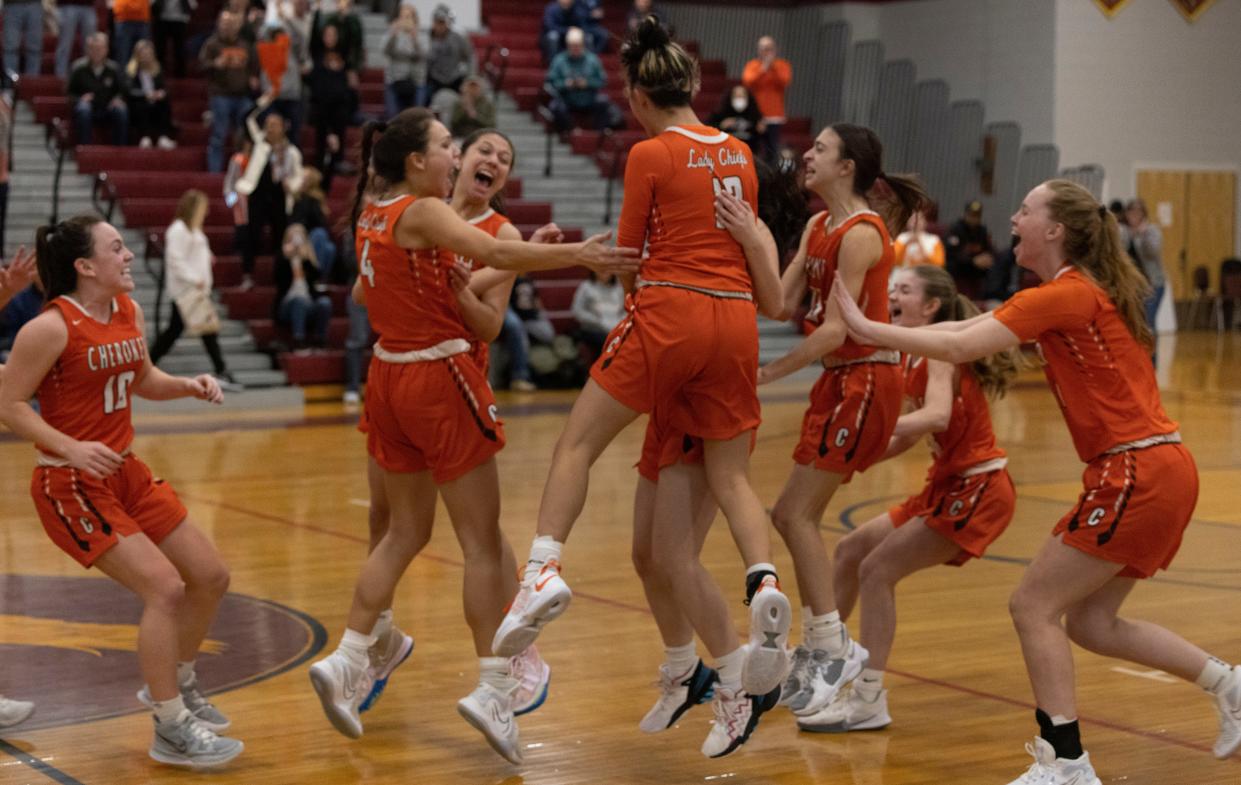 Cherokee players celebrate their victory over Jackson