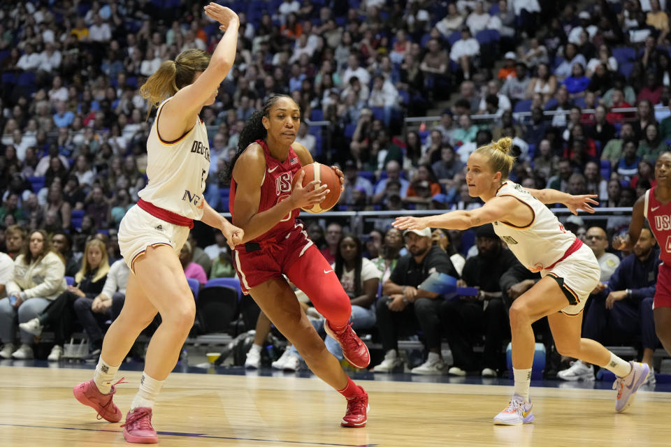 A'ja Wilson secured a double-double by halftime and powered Team USA past Germany in its only international Olympic warmup. (AP Photo/Alastair Grant)