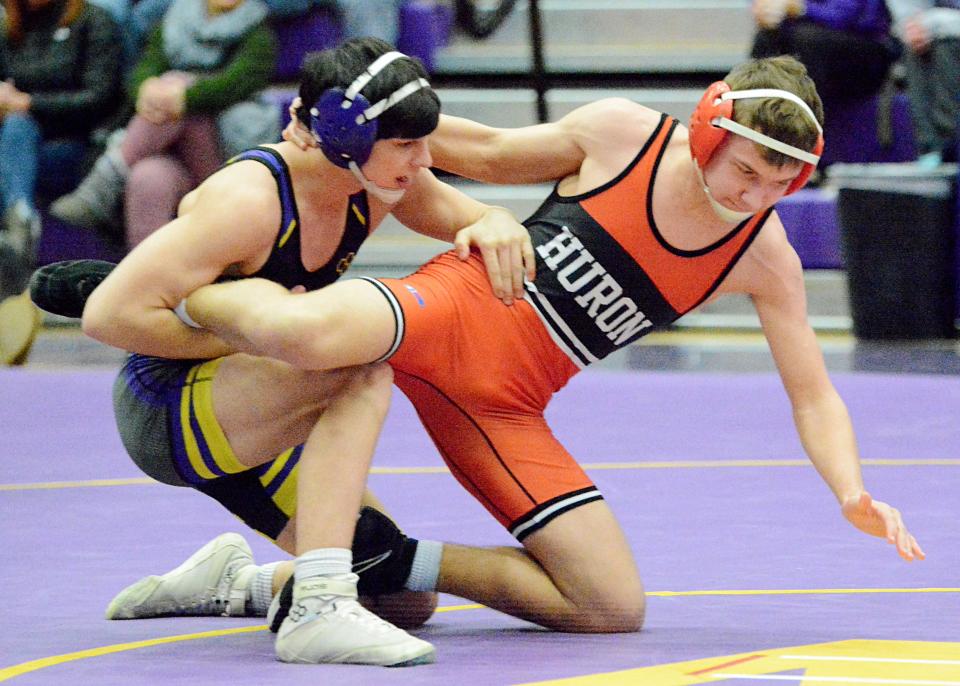 Watertown's Braden Le (left) maintain his hold on Huron's Aiden Zavesky at 132 pounds during an Eastern South Dakota Conference boys' wrestling dual on Thursday, Feb. 2, 2023 in the Watertown Civic Arena.