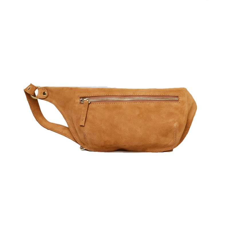 <a rel="nofollow noopener" href="https://rachelcomey.com/collections/bags/products/ante-fanny-pack?variant=8977257791549" target="_blank" data-ylk="slk:Ante Fanny Pack, Rachel Comey, $325A camel-colored piece is perfect for the '70s-inspired woman.;elm:context_link;itc:0;sec:content-canvas" class="link ">Ante Fanny Pack, Rachel Comey, $325<p>A camel-colored piece is perfect for the '70s-inspired woman.</p> </a>