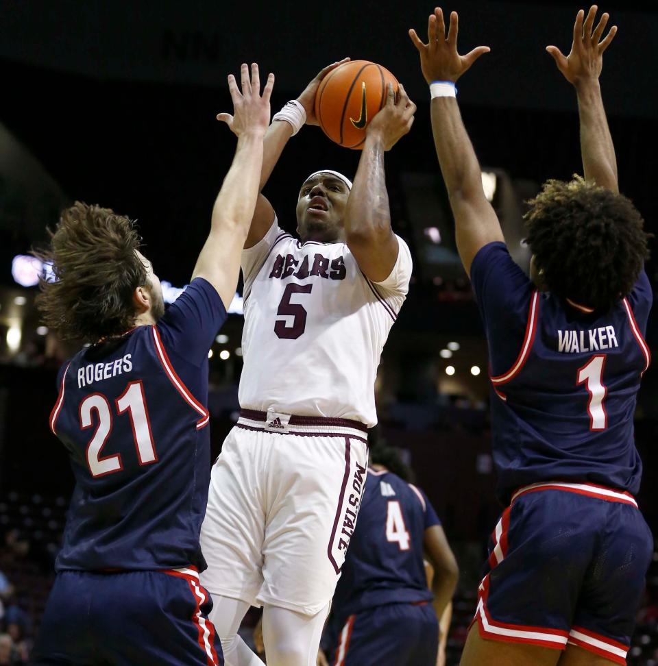 The Missouri State Bears' Donovan Clay looks to score against the defence of Belmont University at Great Southern Bank Arena on February 3, 2024.