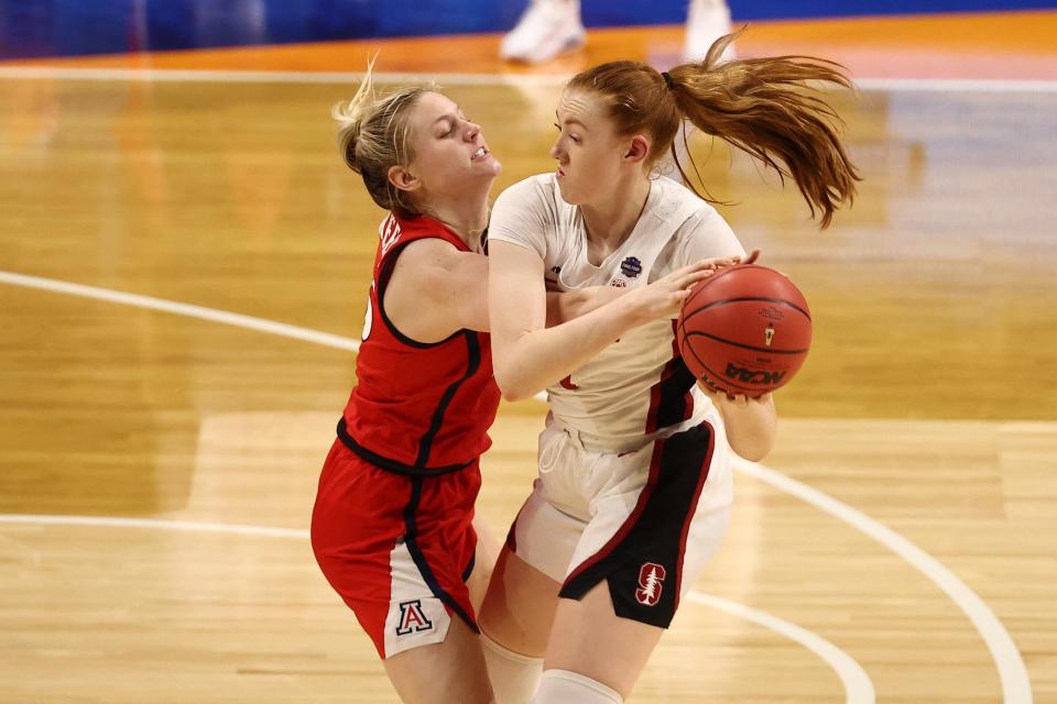 Stanford forward Ashten Prechtel (11) attempts to control the ball as Arizona forward Cate Reese (25) defends during the national championship game.