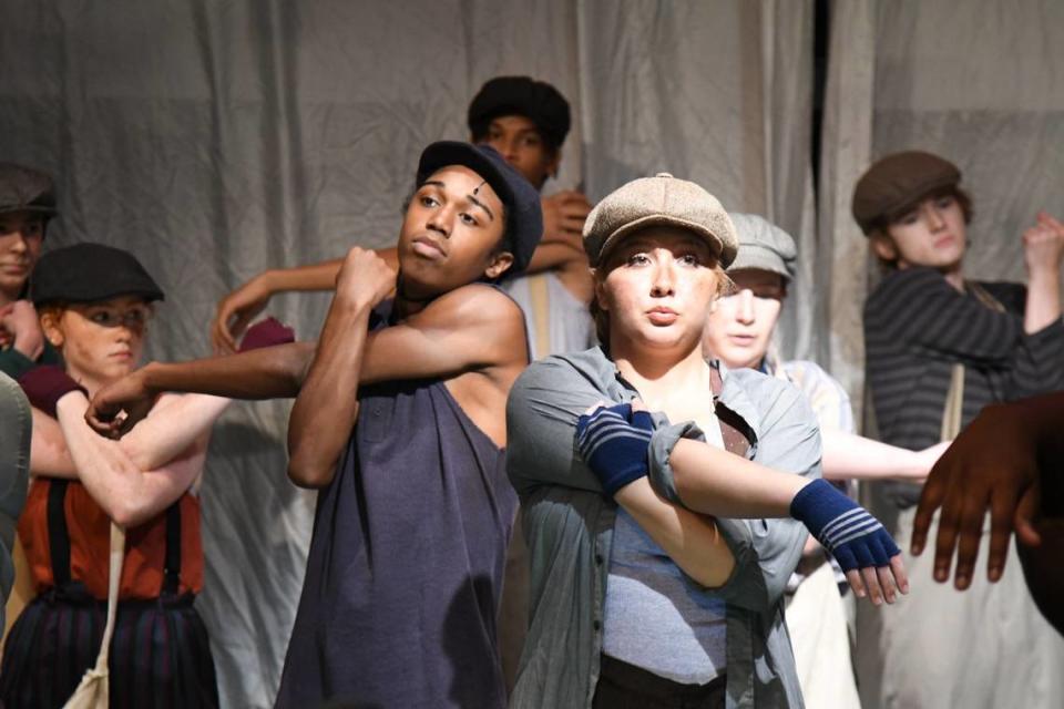 “Newsies” cast members Kahlil Harvey (left) and Nadia Cazacu stretch before the start of dress rehearsal on Tuesday, July 9, 2024, at Theatre Macon in Macon, Georgia. Theatre Macon’s “Newsies” will run from Friday, July 12 to Saturday, July 27.