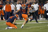 Illinois place kicker James McCourt kicks a field goal off the hold of Blake Hayes during the first half of an NCAA college football game Friday, Sept. 17, 2021, in Champaign, Ill. (AP Photo/Charles Rex Arbogast)