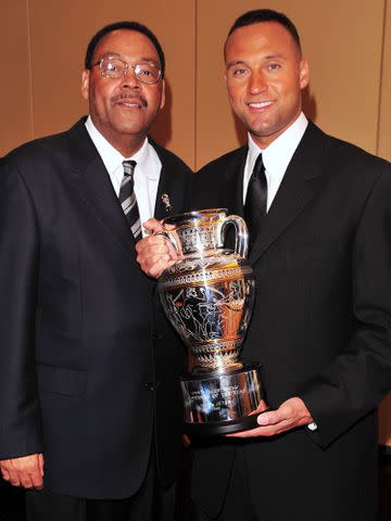 <p>Andrew H. Walker/Getty</p> Derek Jeter and his father, Dr. Sanderson Charles Jeter, attend the 2009 Sports Illustrated Sportsman of the Year Celebration