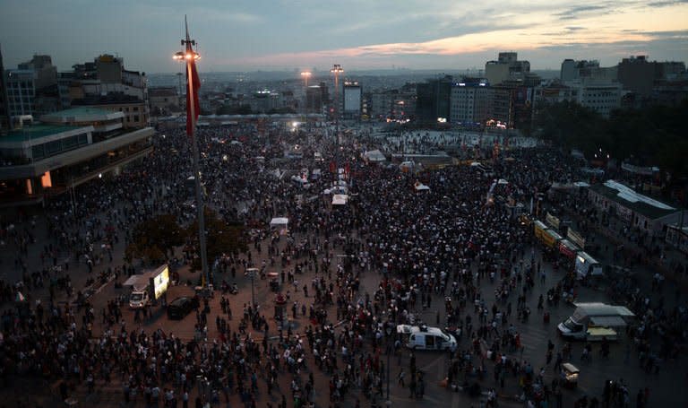 Demonstrators gather in Taksim Square in Istanbul on June 6, 2013. Turkish Prime Minister Recep Tayyip Erdogan enraged demonstrators on Thursday by defiantly vowing to press ahead with a planned park redevelopment that has sparked violent protests, as the country braced for his return from an overseas trip