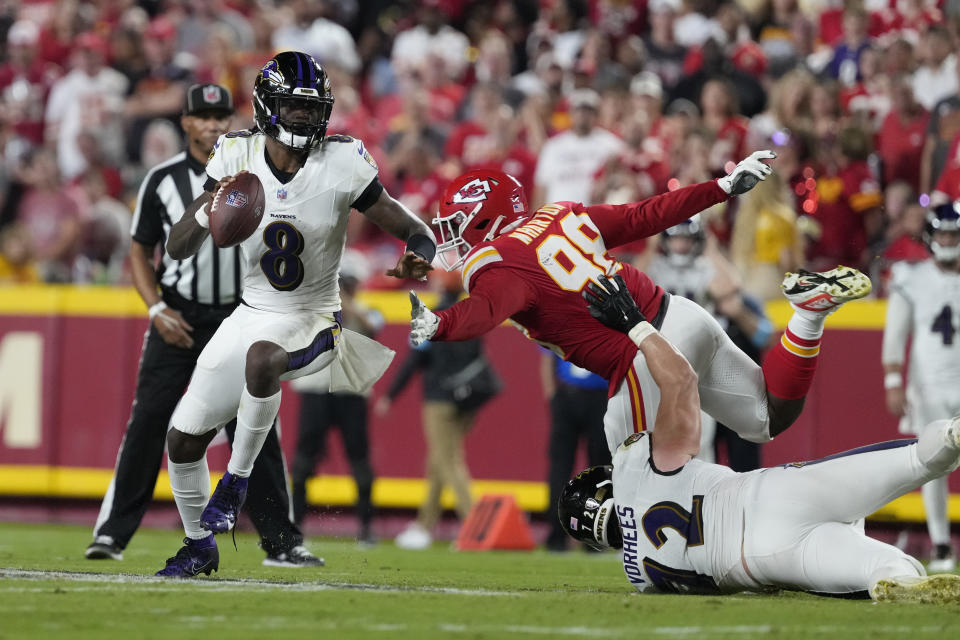 A slimmed down Lamar Jackson showed off his wheels against Kansas City on Thursday night, but his 122 yards rushing wasn't enough for Baltimore. (AP Photo/Ed Zurga)