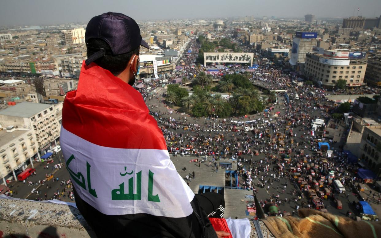 Protestors gather in Tahrir Square in Baghdad on November 3 - Anadolu