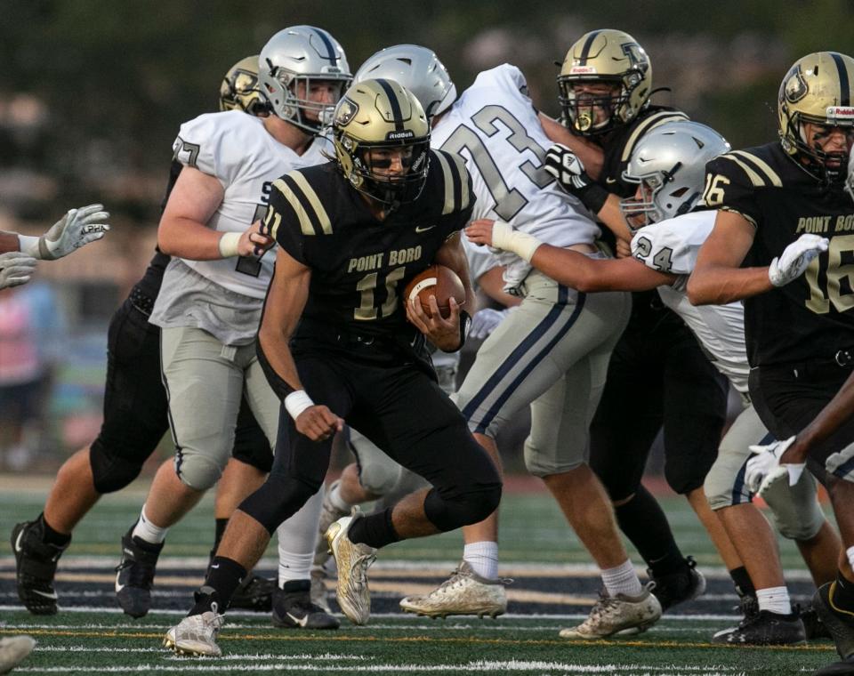 Boro’s Matt Oliphant gains yards on the ground. Manasquan vs Pt. Boro football.Point Pleasant Borough, NJFriday, August 9, 2022