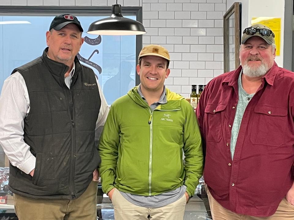 Owner Jim Simpson with some of his crew, Marketing Manager Sam Bruce and business partner Jason Parkerson, at Simpson’s Meats Wednesday, Jan. 19, 2022.