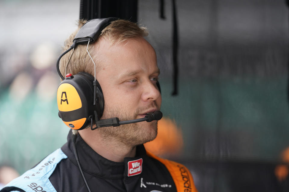 Felix Rosenqvist, of Sweden, talks with his crew before the final practice for the Indianapolis 500 auto race at Indianapolis Motor Speedway, Friday, May 27, 2022, in Indianapolis. (AP Photo/Darron Cummings)