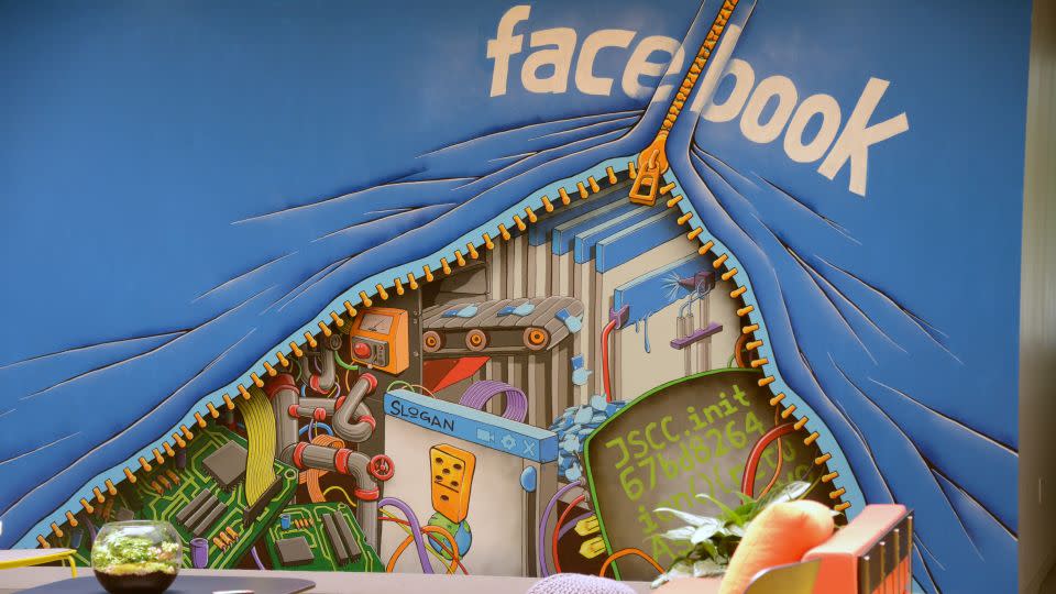 A mural decorates one of the many open work areas at Facebook headquarters in Menlo Park, California. - Robyn Beck/AFP/Getty Images