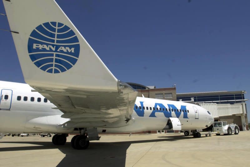 A Pan American Airlines 727 jet sits at MidAmerica Airport on June 6, 2000. On January 6, 1942, a Pan American Airways plane arrived in New York, completing the first around-the-world flight by a commercial airliner. File Photo by Bill Greenblatt/UPI