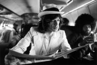 <p>Sure, celebrities looked cool as hell <a href="https://www.esquire.com/style/mens-fashion/g13142501/celebrities-at-the-airport-in-the-1970s-the-photos/" rel="nofollow noopener" target="_blank" data-ylk="slk:strutting through airports in the 1970s;elm:context_link;itc:0;sec:content-canvas" class="link ">strutting through airports in the 1970s</a>, emanating pure style and class. But what about when they boarded the plane? In these photographs from the same decade—when air travel wasn't the dehumanizing nightmare it is today—movie stars and musicians relax, party, and pose on their private jets. This is flight done right. </p>