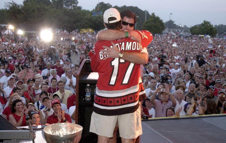 Rod Brind’Amour gets a hug from coach Peter Laviolette at the Hurricanes’ 2006 Stanley Cup celebration in Raleigh. Chris Seward/File photo