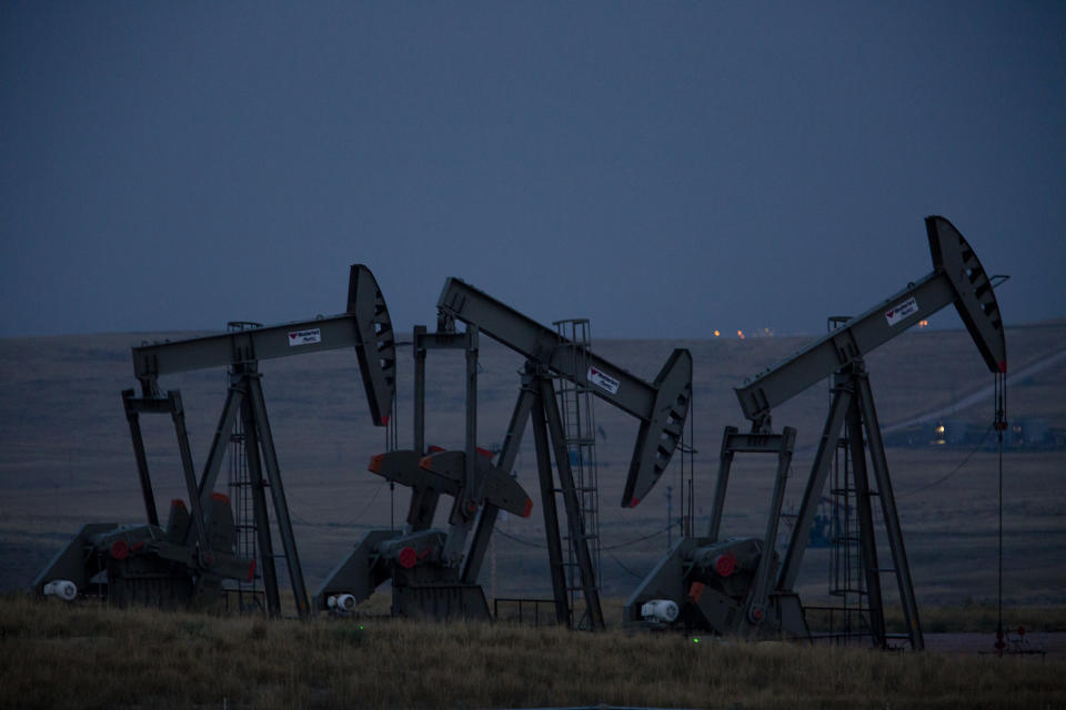 Pumpjacks operate at an oil well site near Gillette, Wyoming. Natural resources are the lifeblood of the state's economy.
