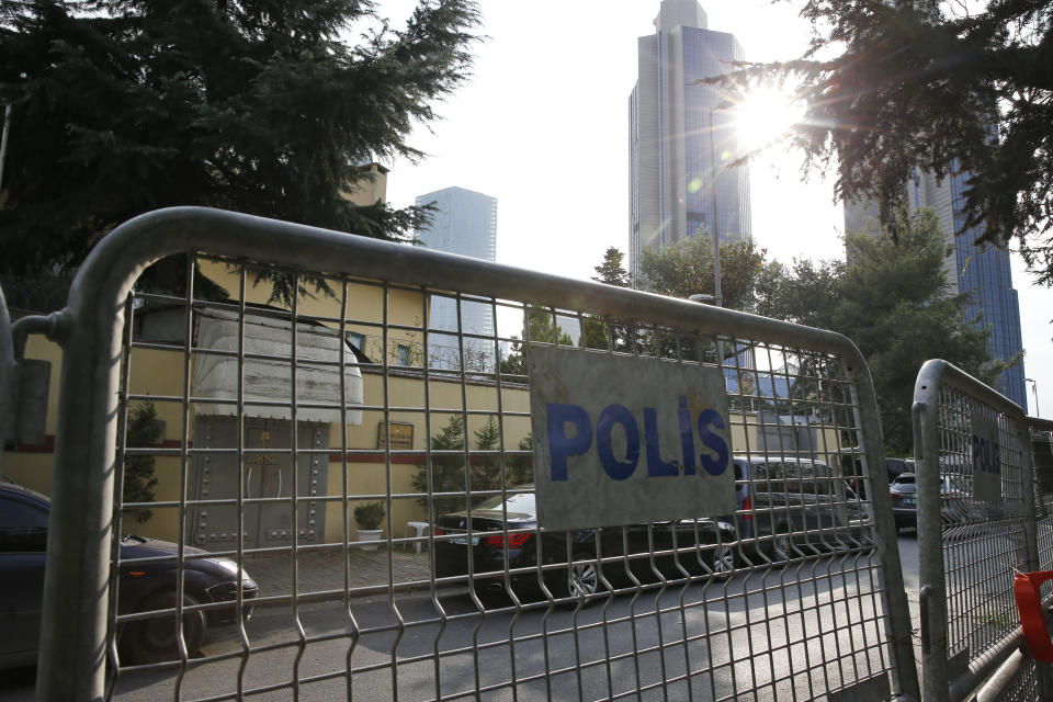 Barriers block the road leading to Saudi Arabia's consulate, background, in Istanbul, Saturday, Oct. 20, 2018. Turkey will "never allow a cover-up" of the killing of Saudi journalist Jamal Khashoggi in Saudi Arabia's consulate in Istanbul, a senior official in Turkey's ruling party said Saturday after Saudi Arabia announced hours earlier that the writer died during a "fistfight" in its consulate. (AP Photo/Lefteris Pitarakis)