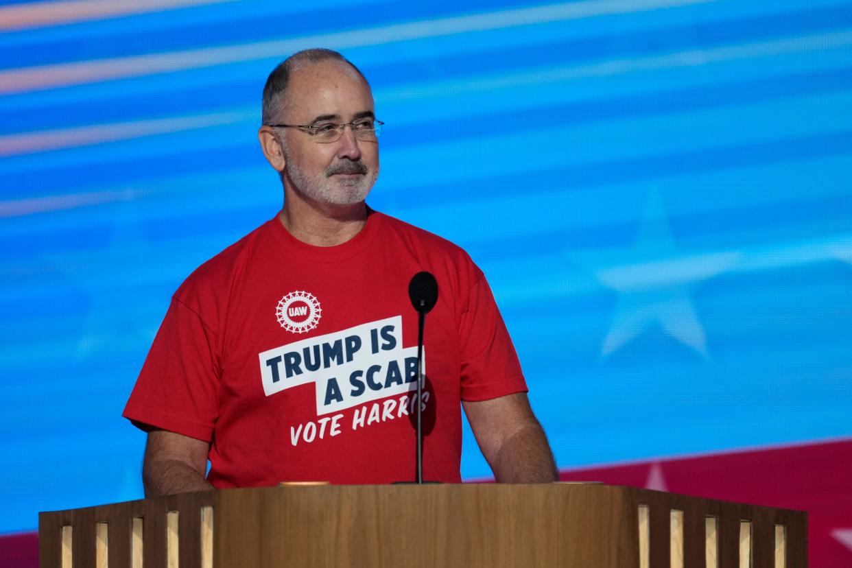 Shawn Fain, President of the United Automobile Workers speaks during the first day of the Democratic National Convention at the United Center.