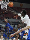 Oregon State center Chol Marial, top, blocks a shot by Duke forward Mark Mitchell (25) during the second half of an NCAA college basketball game in the Phil Knight Legacy Tournament in Portland, Ore., Thursday, Nov. 24, 2022. (AP Photo/Craig Mitchelldyer)