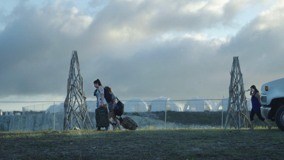 Fyre Festival guests discover that their “luxury accommodations” are disaster-relief tents in Chris Smith’s documentary <em>Fyre</em>. (Photo: Netflix)