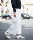 <p>Next-level white sneakers include brushed gold (this pair is by <a rel="nofollow noopener" href="http://www.anrdoezrs.net/links/7799179/type/dlg/sid/InStyleFASStreetStyleGuideACOct/https://www.ssense.com/en-us/men/product/valentino/white-gold-open-sneakers/1523703?forced_user_country=US&gclid=CjwKEAjwj92_BRDQ-NuC98SZkWYSJACWmjhlu_P_k57Y3SXuV7UFev85ISbLzrOZx4k2QYzbHVvfGxoCcKTw_wcB" target="_blank" data-ylk="slk:Valentino;elm:context_link;itc:0;sec:content-canvas" class="link ">Valentino</a>).</p>