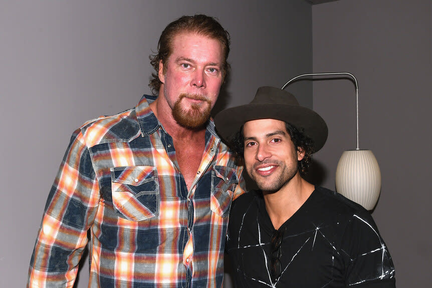 Kevin Nash and Adam Rodriguez pose for a photo together