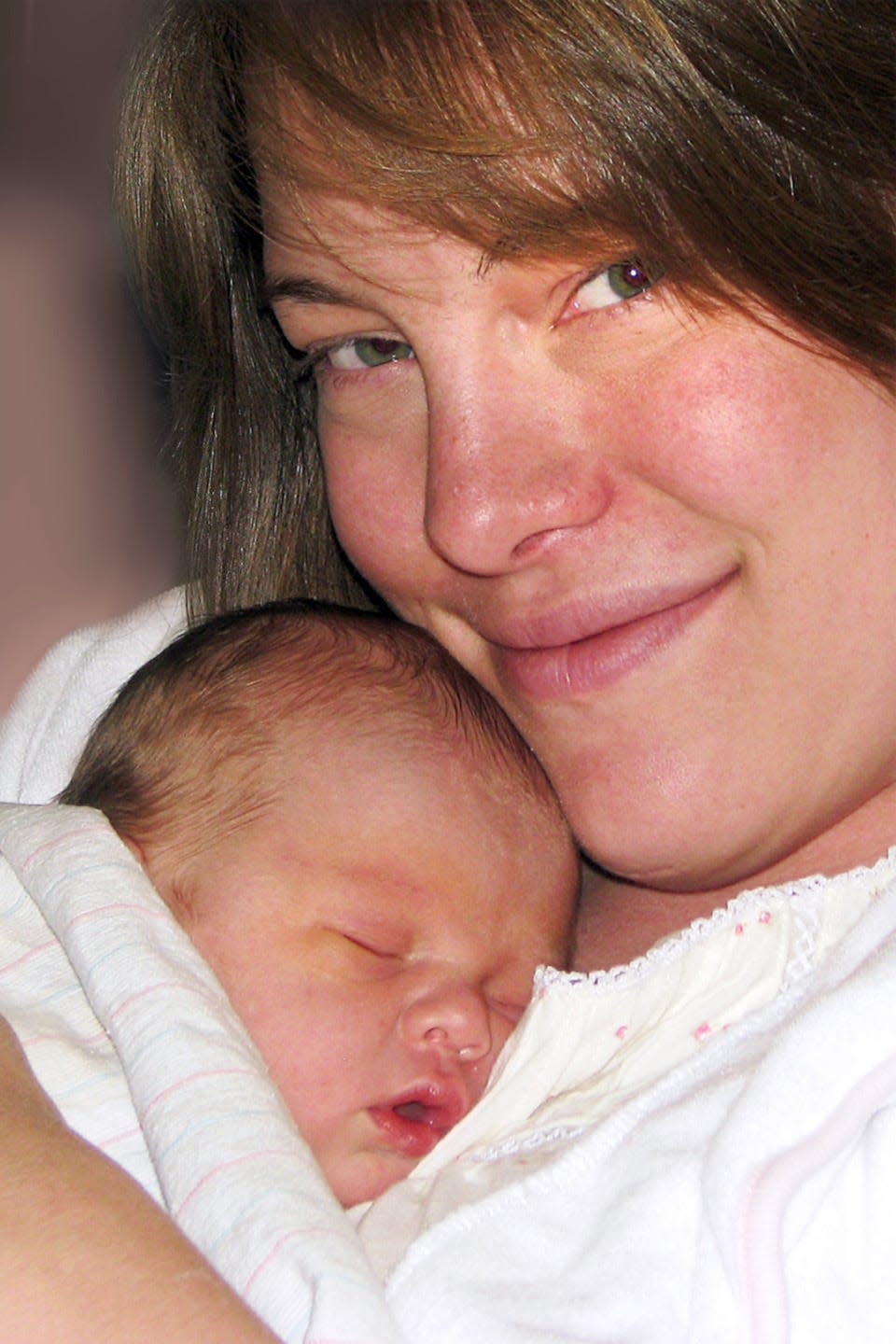 Sarah Wilkerson holds her son Noah in 2009 shortly after his birth.