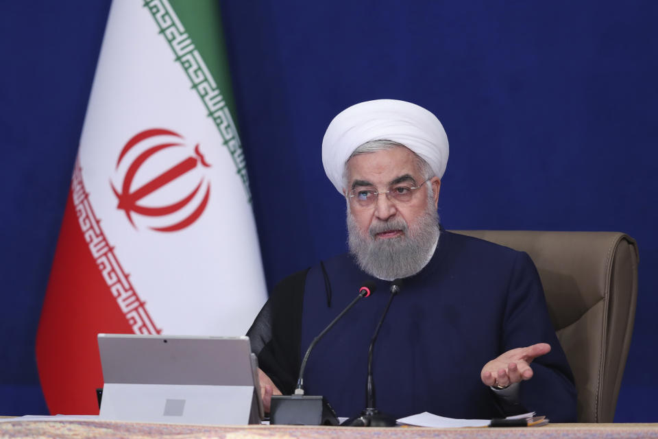 In this photo released by the official website of the office of the Iranian Presidency, President Hassan Rouhani speaks in a cabinet meeting in Tehran, Iran, Wednesday, July 14, 2021. The outgoing president on Wednesday warned his country could enrich uranium at weapons-grade levels of 90% if it chose, though it still wanted to save its tattered nuclear deal with world powers. (Iranian Presidency Office via AP)