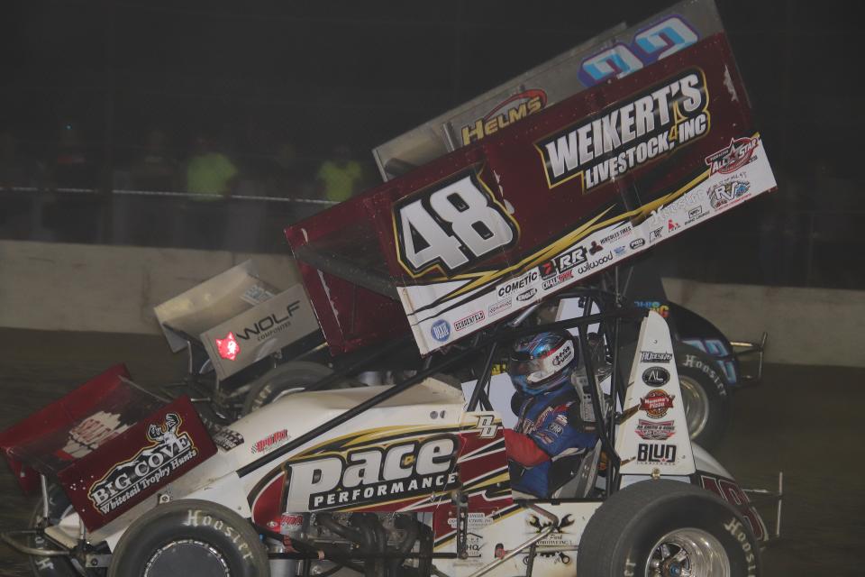 Cole Duncan, top, passes Danny Dietrich for the win on the last lap Saturday at Fremont Speedway.