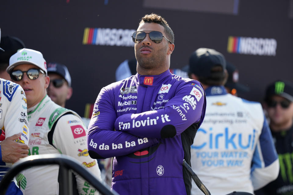 Bubba Wallace looks on before driver introductions at a NASCAR Cup Series auto race, Sunday, June 16, 2024, at Iowa Speedway in Newton, Iowa. (AP Photo/Charlie Neibergall)