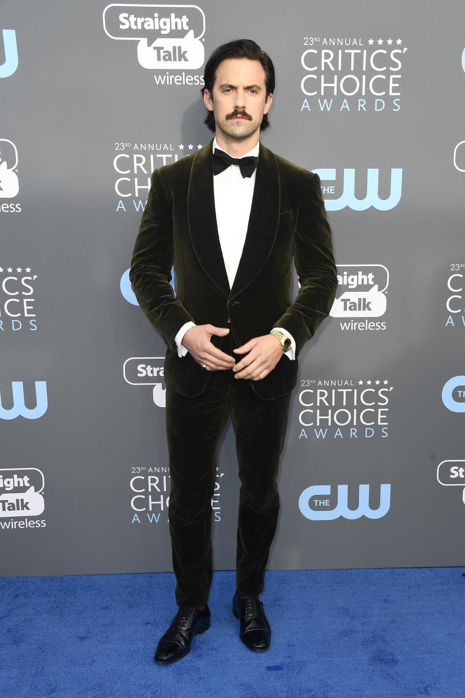Milo Ventimiglia in Ralph Lauren with Christian Louboutin shoes, a David Yurman ring, Rolex watch, and Montblanc cuff links