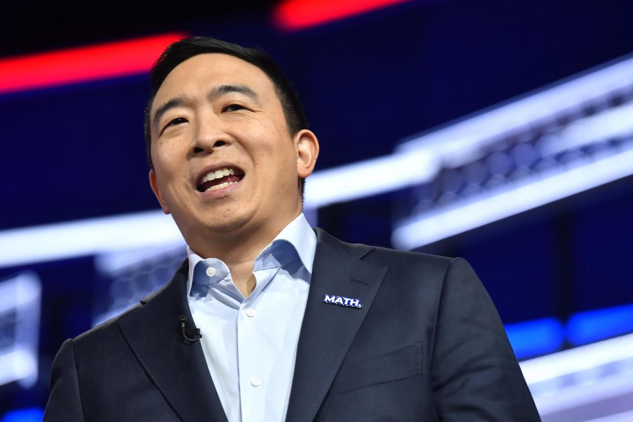 Democratic presidential candidate former technology executive Andrew Yang walks onto the stage before a Democratic presidential primary debate in Atlanta. (AP Photo/John Bazemore): AP