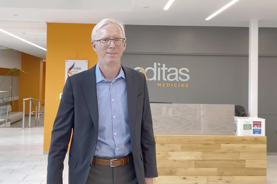 Charles Albright, executive vice president and chief scientific officer at Editas Medicine, a genome-editing company, in Cambridge, Mass., walks through the company's office on Jan. 8, 2020. “We literally have the potential to take people who are essentially blind and make them see,” said Albright, whose company is developing a gene editing treatment for blindness with Dublin-based Allergan. “We think it could open up a whole new set of medicines to go in and change your DNA." (AP Photo/Rodrique Ngowi)