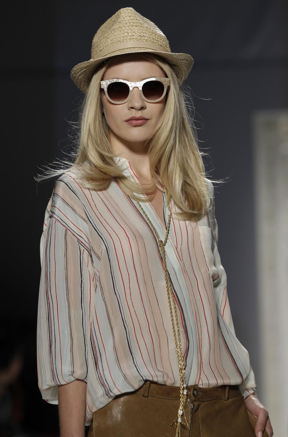 A model wears a design from the Rachel Zoe Spring 2013 collection at Fashion Week in New York, Wednesday, Sept. 12, 2012. (AP Photo/Kathy Willens)