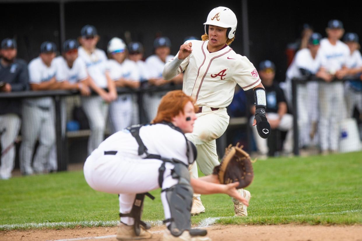 Andrean's Caleb Smith scores during the Saint Joseph vs. Andrrean regional semifinal baseball game Saturday, June 4, 2022 at Griffith High School. 