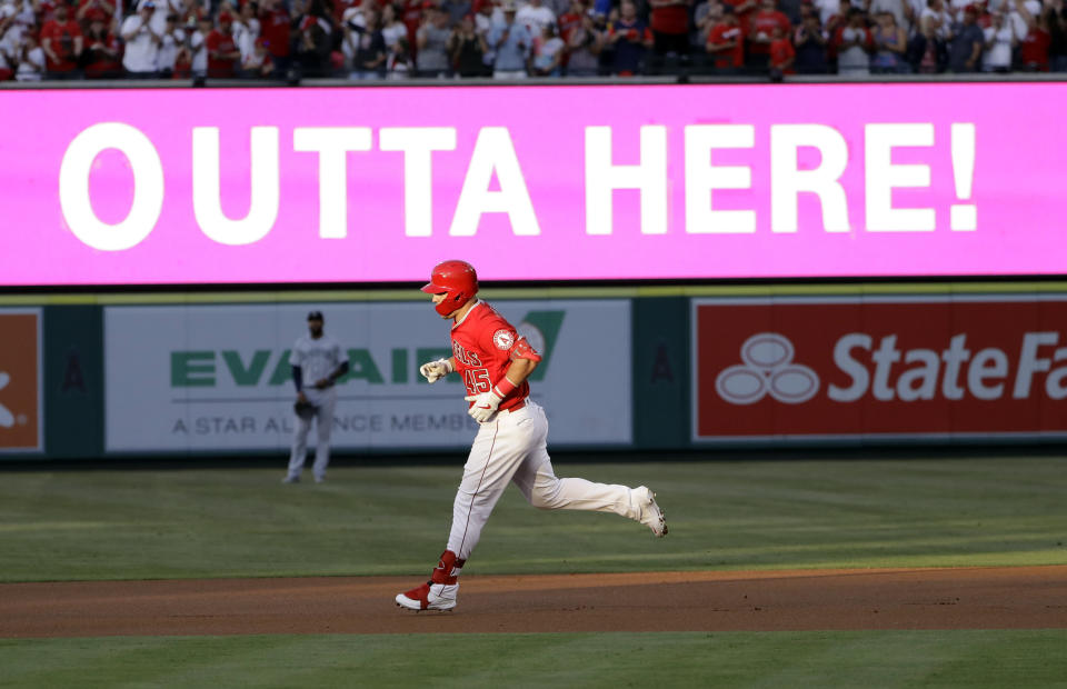 Mike Trout and the Angels batted around in memorable first inning after paying tribute to Tyler Skaggs. (AP Photo/Marcio Jose Sanchez)