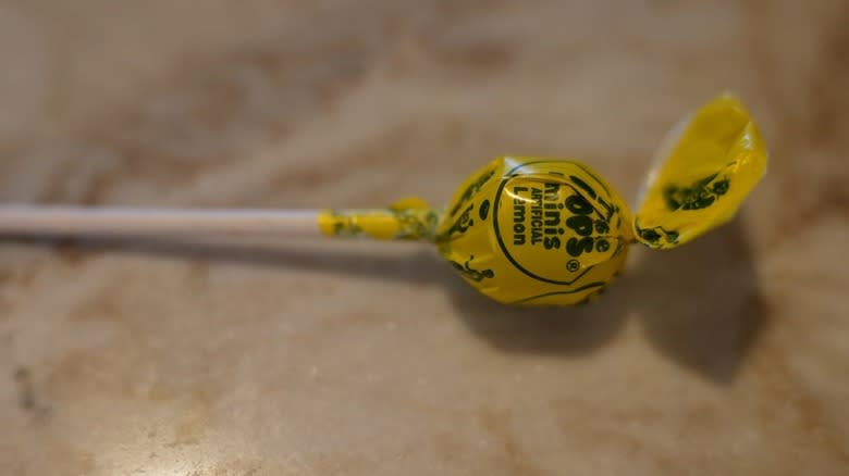 Lemon Tootsie Pop on counter